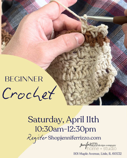 Promo for beginner crochet Saturday, April 11 10:30am-12:30pm register at Shopjenniferrizzo.com . A hand holding yarn and a crochet hook working on a crochet stitch