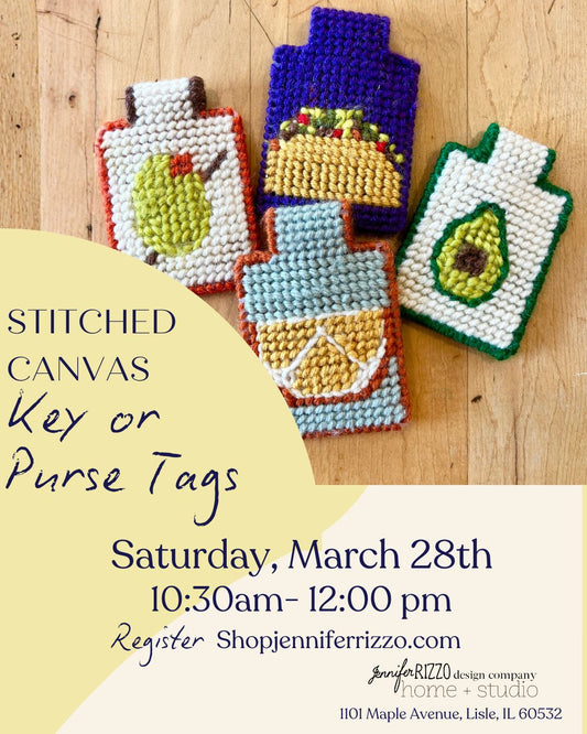 Stitched canvas key or purse tags on a wooden surface with promotional text for a workshop.
